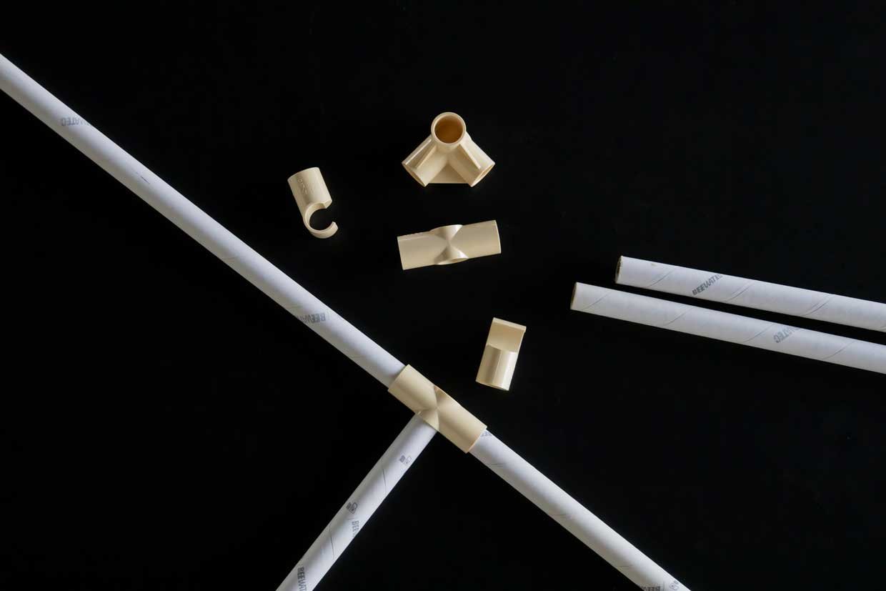 Connecting cardboard pipes with plastic pipe connectors