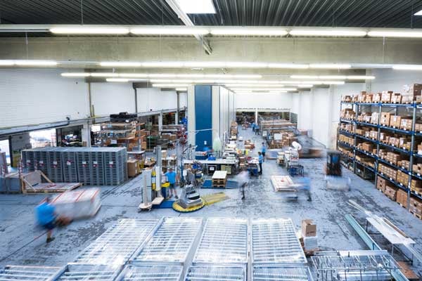 The overhead view shows the hustle and bustle in a large BeeWaTec warehouse.