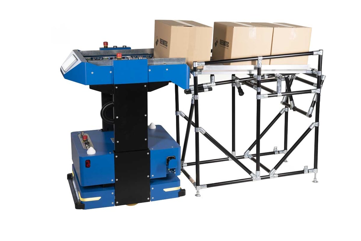 Autonomous mobile robot from BeeWaTec (BARY) delivers carton to transfer point from pipe racking system